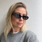 Sonnenbrille ovale Gläser Cat Eye Schwarz